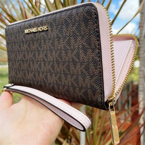 michael kors weistlet|Michael Kors oversized wallet.